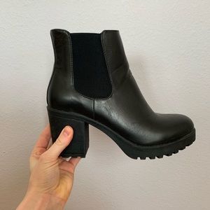 Black platform heeled boots
